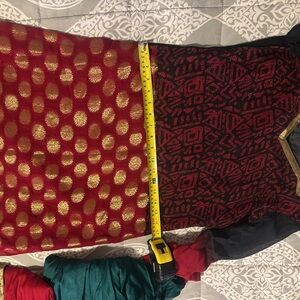 Red and Black Patterned Dress with Gold Accents